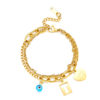 Bracelet chainette Bohème orné avec divers pendentifs fantaisie