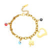 Bracelet chainette Bohème orné avec divers grelots fantaisie